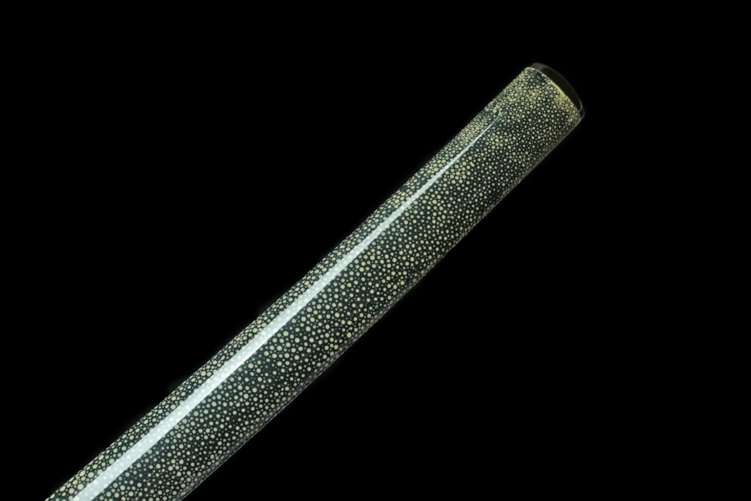 Hand-forged Japanese sword with detailed craftsmanship and polished blade